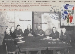 01 -  Le Gnral Eiseinhower, entour de son tat-major, ordonne le dbarquement en Normandie